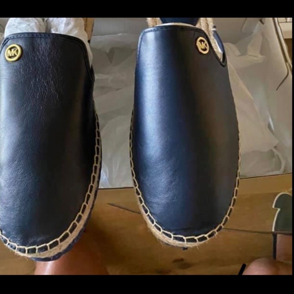 Michael Kors blue slides. Never worn.